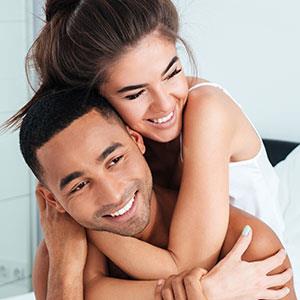 couple smiling, ready to meet new couples