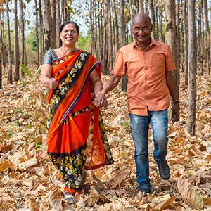 Indian couple walking together, holding hands