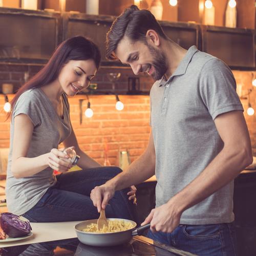 food lovers, couple cooking dinner