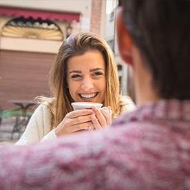 singles on a date, woman laughing