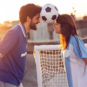 couple playing soccer